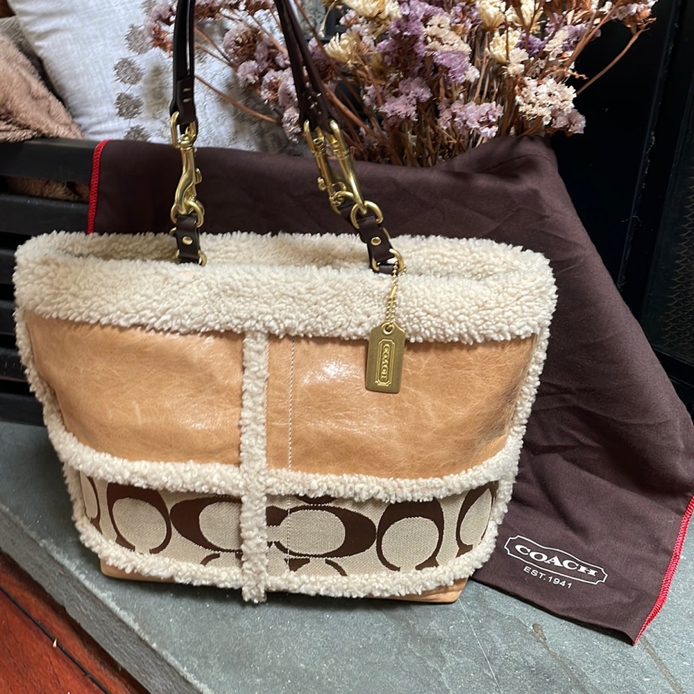 Coach pocket book